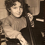 kid playing a cello