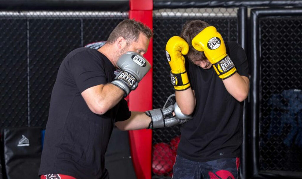 adults practicing Kickboxing
