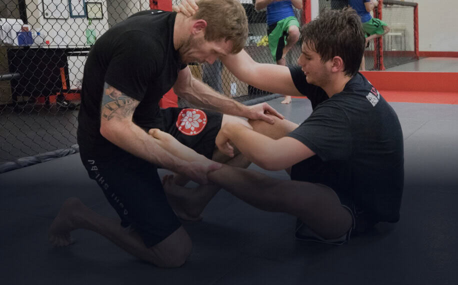 Two students practicing martial arts