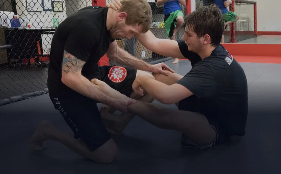 Two students practicing martial arts